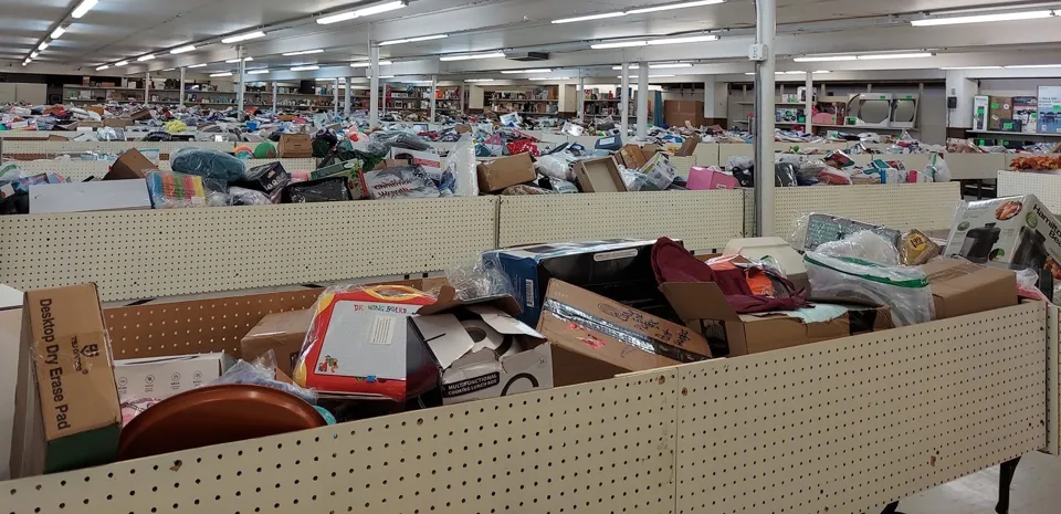 Rows of HOB shopping bins filled with overstock home goods and merchandise